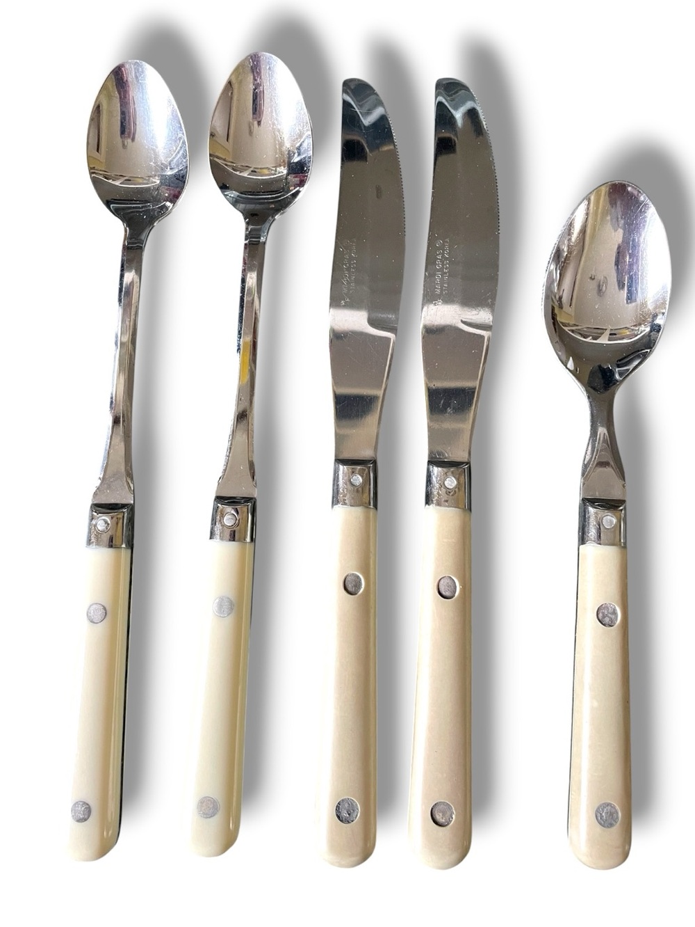 Washington Forge, Mardi Gras pattern, 2 ice tea spoons. 2 butter knives, 1 teasp